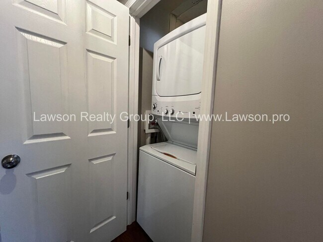 Building Photo - Charming Brick Ranch with Beautifully Landscaped Yard and Attached Carport