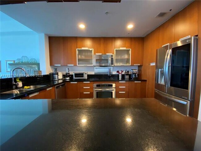 Building Photo - 7901 Hispanola Ave