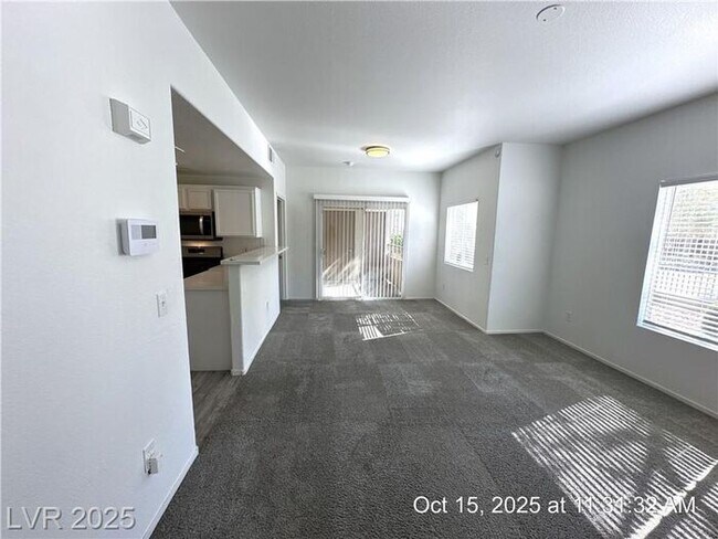 Building Photo - SPACIOUS FIRST-FLOOR CONDO LOCATED IN A GA...