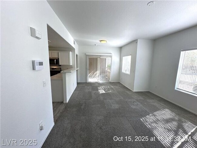 Building Photo - SPACIOUS FIRST-FLOOR CONDO LOCATED IN A GATED COMMUNITY!