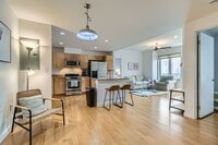 Building Photo - 2-BDR Retreat with Rooftop Pool & Gym