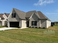 Building Photo - Welcome to this spacious 4 bedroom, 3 bath...