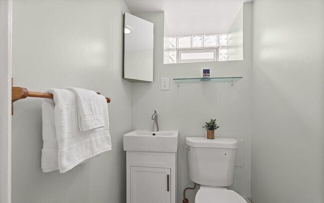 Building Photo - Updated 3BR Catonsville Townhome | Rear Parking + Deck