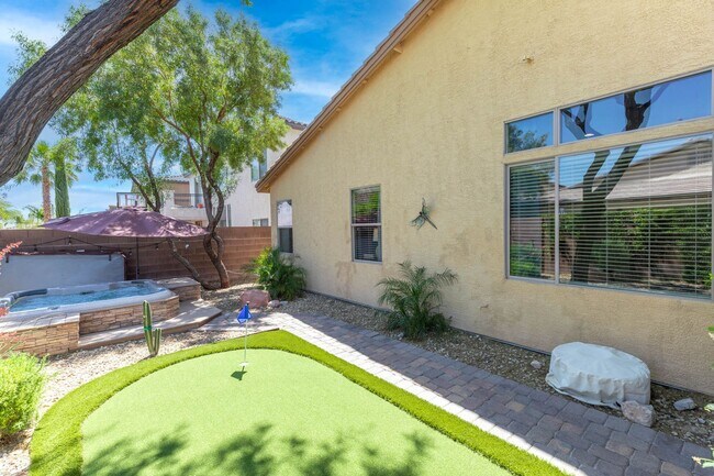 Building Photo - Spacious Mountain’s Edge Home with Den, Sunroom, 3-Car Garage & Private Spa Retreat