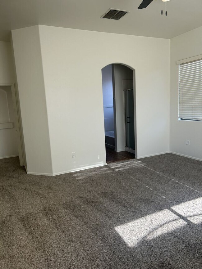 Building Photo - Unfurnished four bedroom large home!  Three car garage