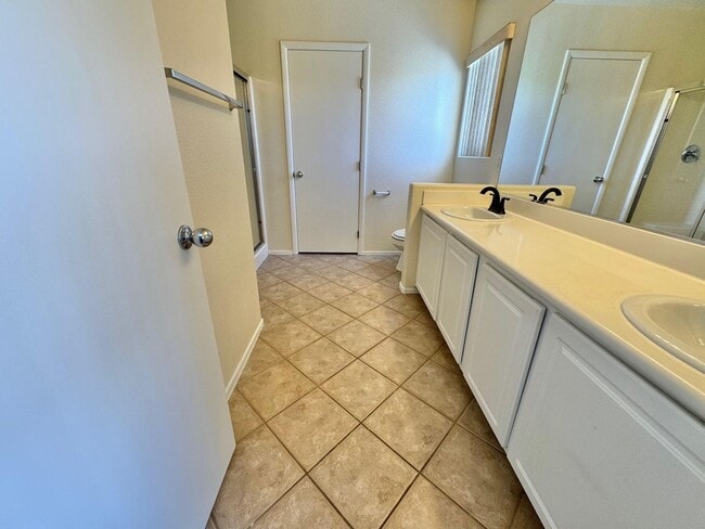Building Photo - WELCOME TO THIS SPACIOUS 4-BEDROOM, 2.5-BA...