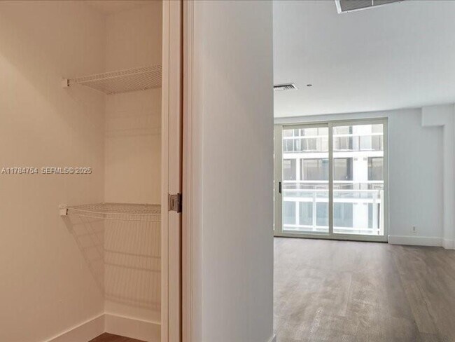 Building Photo - 9499 Collins Ave