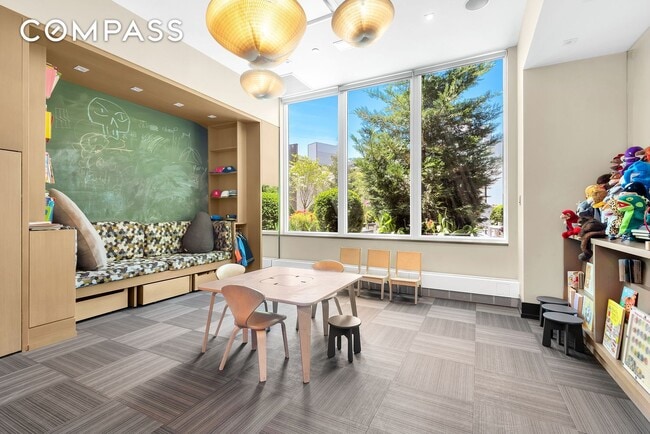 Building Photo - Elegant Condo Living with Impressive Views and Exclusive Building Amenities in the Heart of Downt...