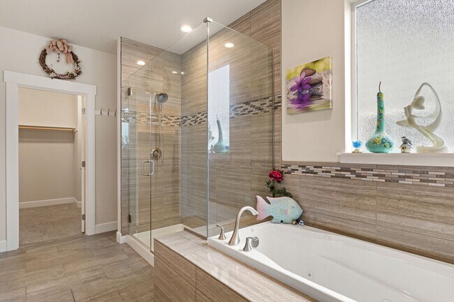Building Photo - 3-bedroom, 2-bathroom home featuring an op...
