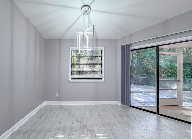 Building Photo - MODERN & Redone 1/1 w/ Tile Floors Throughout, Stainless Appliances, Granite Counters, Washer/Dry...
