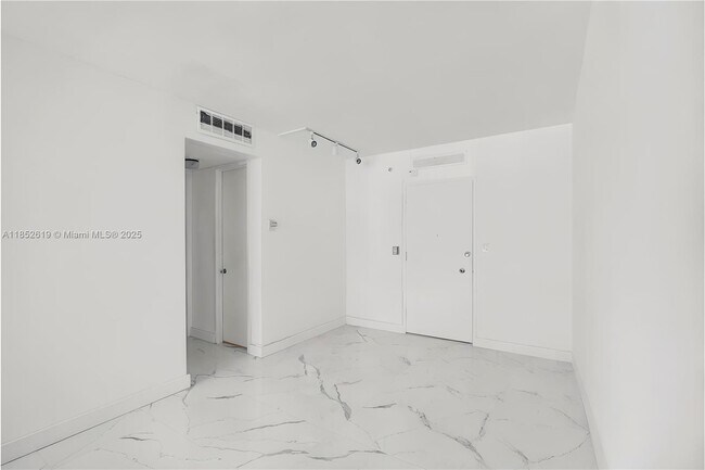 Building Photo - 5055 Collins Ave