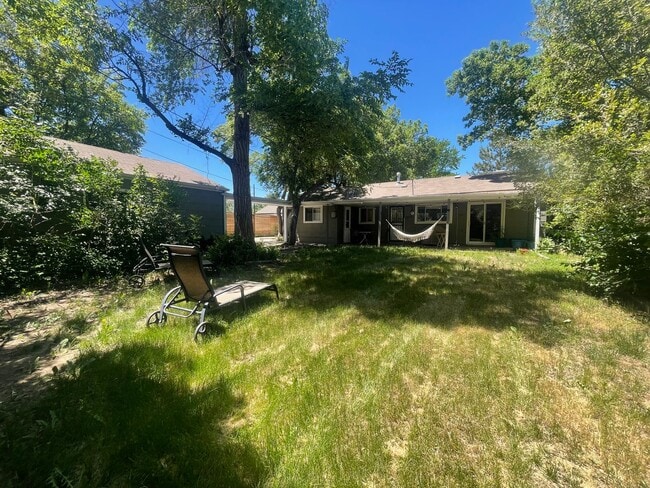 Building Photo - $0 DEPOSIT OPTION. CHARMING 3-BEDROOM HOME WITH LARGE YARD AND EASY ACCESS TO I-25 AND I-225