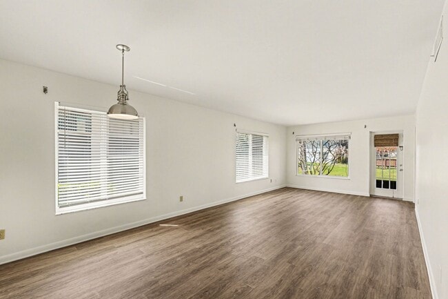 Building Photo - Must see 1st floor, end unit with lots of natural light in St Lucie Gardens.