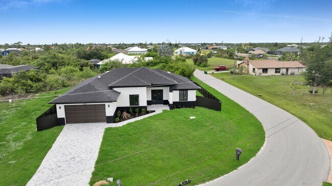 Primary Photo - Brand-New Pool Home for Rent – Port Charlo...