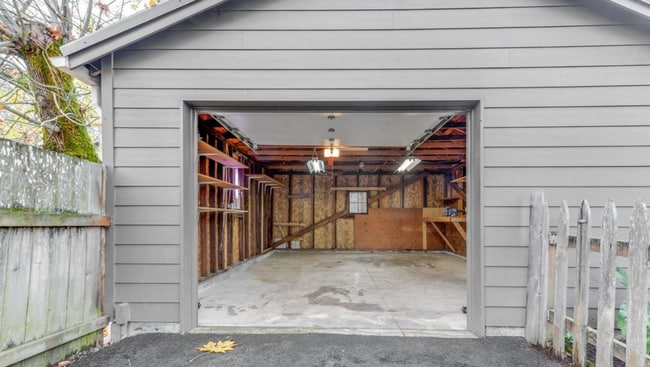 Building Photo - Charming 2 Bedroom 1 Bathroom Bungalow with Oversized 1 Car Garage and Large Manicured  Backyard ...