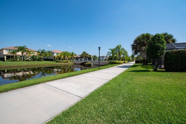 Building Photo - Deluxe Villa Lake view all Tile. 3 Bedrooms+2 Baths