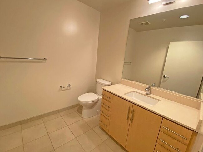 Building Photo - Live at The Axis High-Rise! Upscale, Urban...