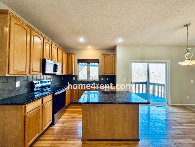 Building Photo - Gorgeous, Updated Home w/ Granite Counters and Wood Floors in Kitchen, Walkout Finished Basement!