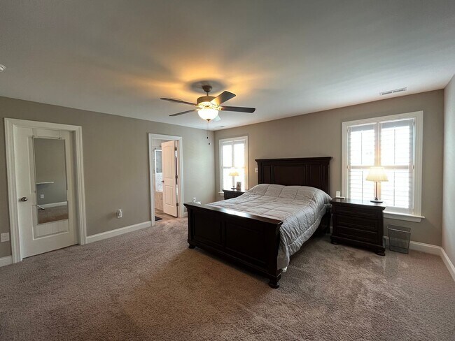 Building Photo - Exceptional 4BD, 2.5BA Cary Townhome with 2-Car Garage, Bonus 2nd Floor Living Space, and Private...