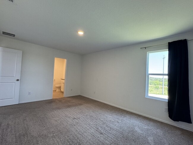 Building Photo - Like new 4/2.5 home (2023) in Morgan Heights with loft and big yard