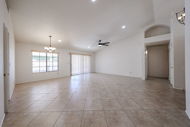 Building Photo - Welcome to this stunning 4-bedroom, 2-bath...
