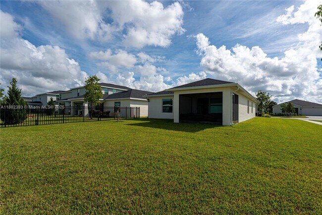 Building Photo - 6172 NW Sweetwood Dr