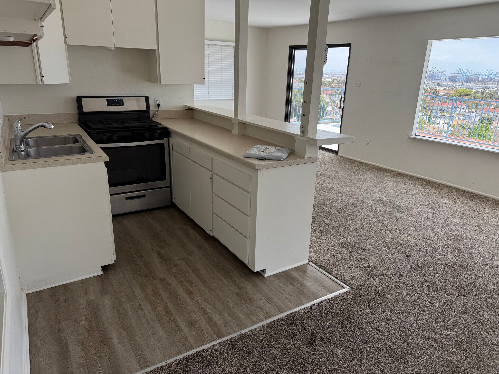 Kitchen with stove - does not come with fridge. - 3325 S Carolina St