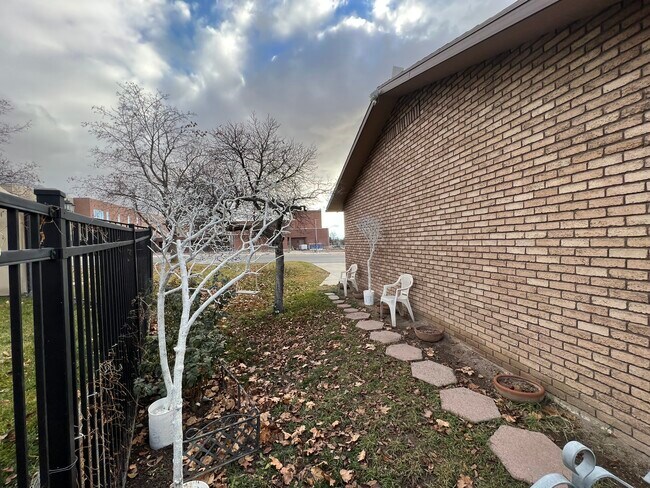 East side yard - 685 Quail Valley Dr