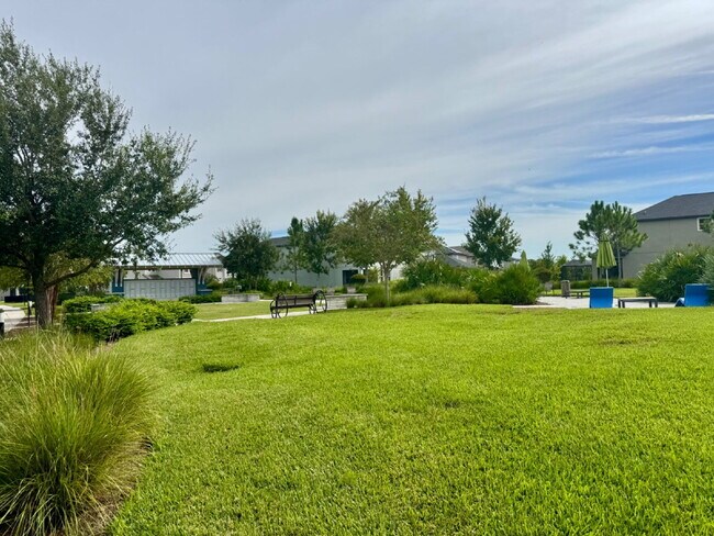 Building Photo - "Spacious 4-Bed Home with Granite Countert...