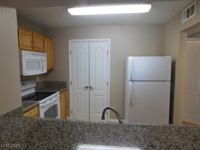 Building Photo - 5055 W Hacienda Ave