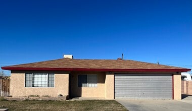 Building Photo - 24437 Tamarisk Ave