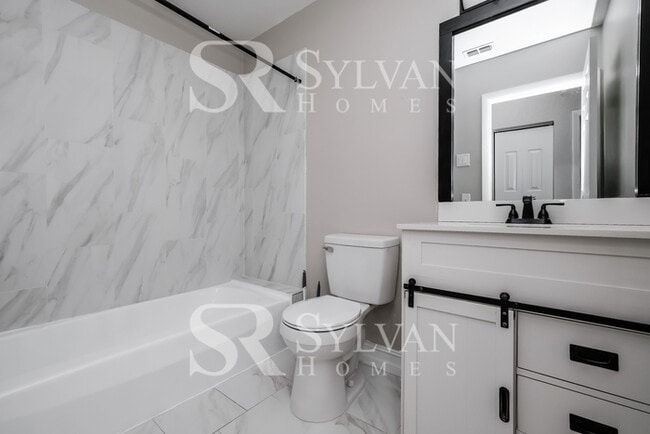 Building Photo - You Can Afford to Dwell Well.