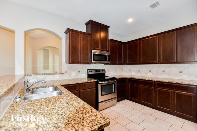 Building Photo - 8817 Tenderfoot Ln