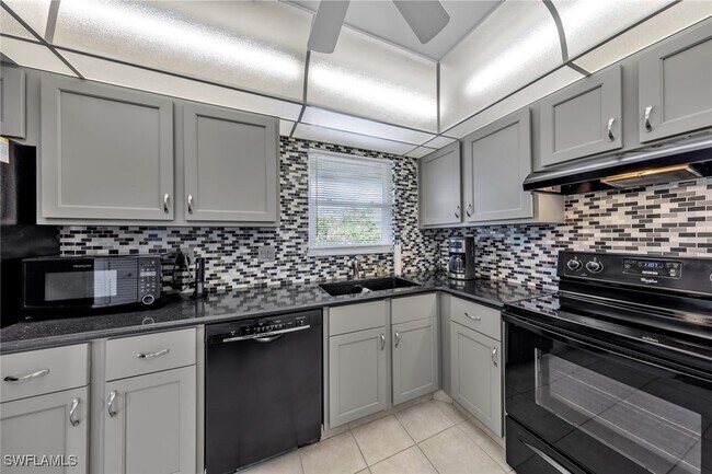 Building Photo - 12250 Tamiami Trl E