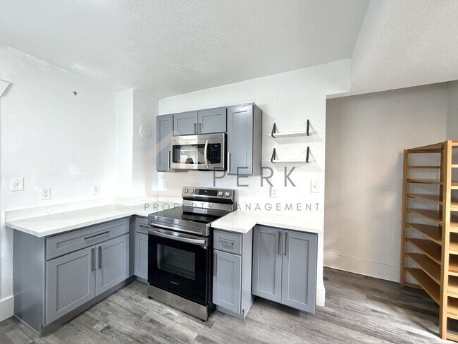 Building Photo - Charming Updated South Tacoma Home with Spacious Bonus Loft and Fenced Yard