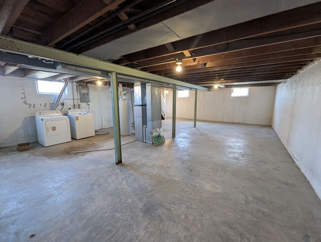 Building Photo - Fully Renovated Home with Sunroom, Garage & Huge Fenced Yard