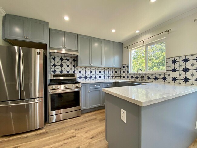 Building Photo - Remodeled 3BR, 2BA with Orchard, Garage & ...