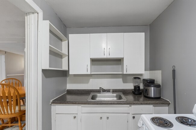 Building Photo - Turnkey Northside Duplex – Fully Renovated...
