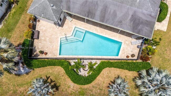 Building Photo - 4902 N Travelers Palm Ln