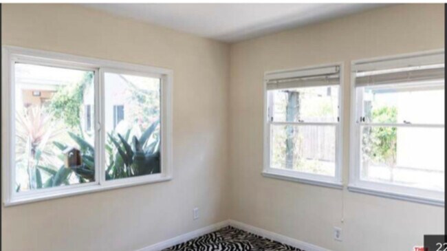 One of the bedrooms facing the backyard - 3864 Girard Ave