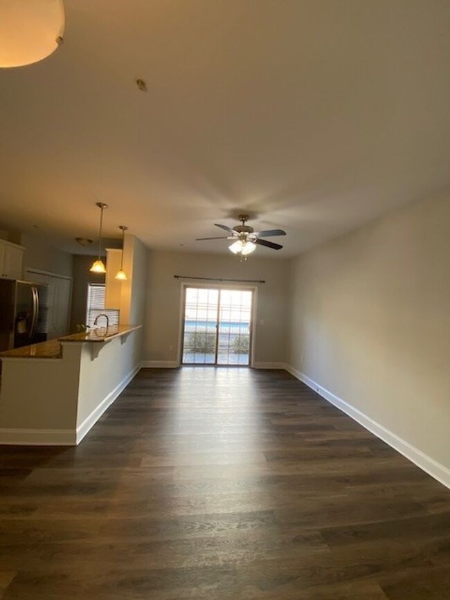 Building Photo - Welcome to this stunning 1st floor condo l...