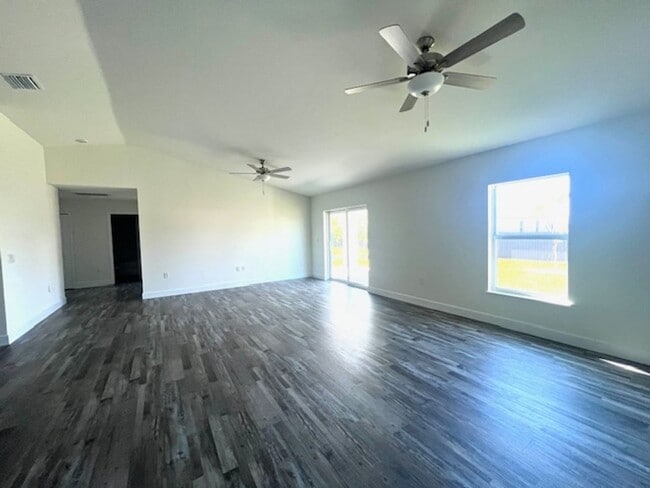 Building Photo - Available Now!! NW CAPE CORAL - 4 Bedrooms - 3 Bathrooms - 2 Car Garage