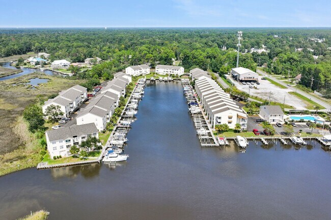 Building Photo - WATERFRONT LIVING! BEAUTIFULLY APPOINTED CONDO ON THE BAYOU IN OS SCHOOL DIST - FULLY FURNISHED