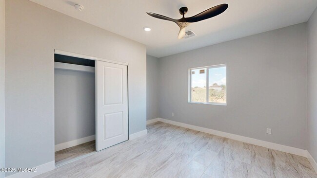 Building Photo - 7095 W Los Reales Rd