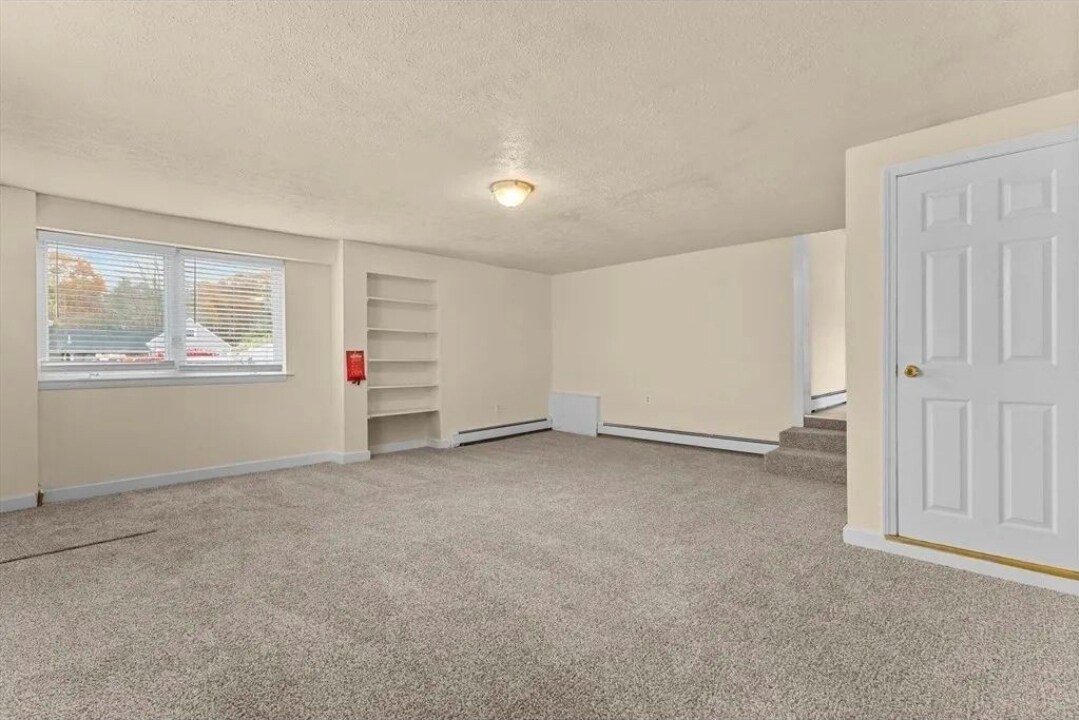 Living area - fresh wall to wall carpet - 333 Groveland St