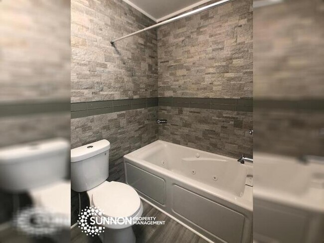 Building Photo - Completely Renovated 3 BR with Huge Yard