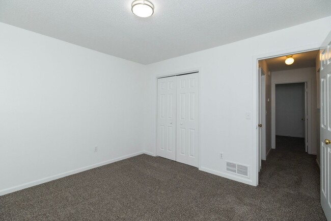 Building Photo - ****COMING SOON**** 3 Bedroom Townhome nea...
