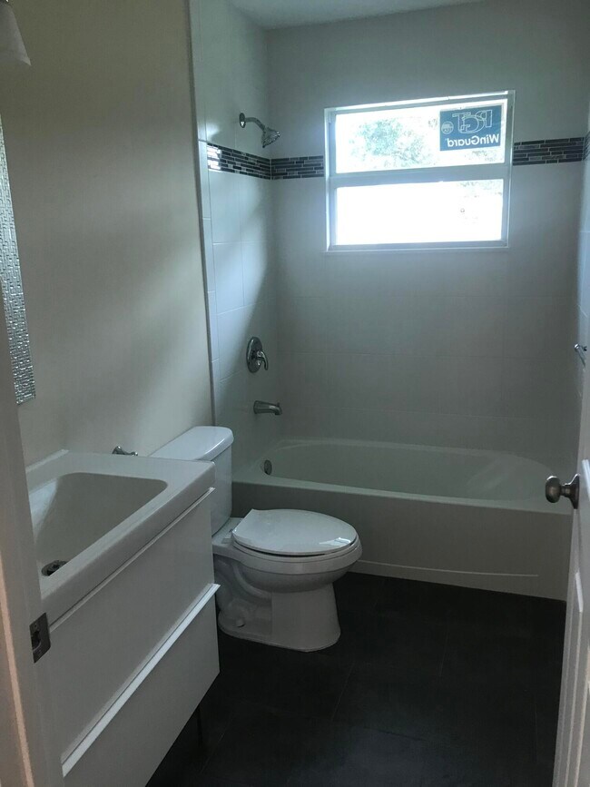 Building Photo - 3196 SW Areca Dr