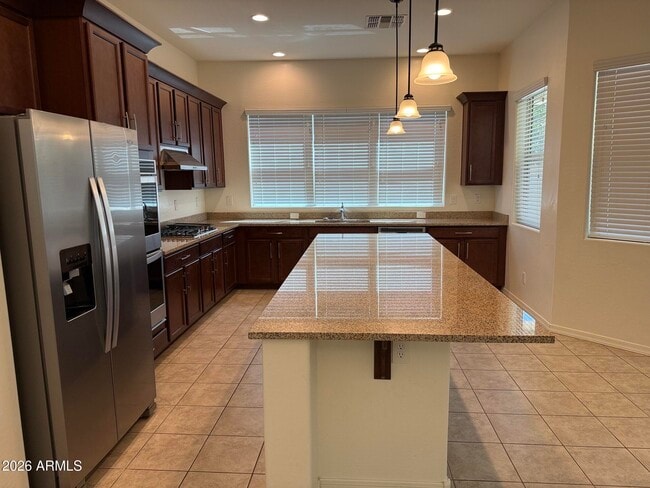 Building Photo - 9553 E Theia Dr