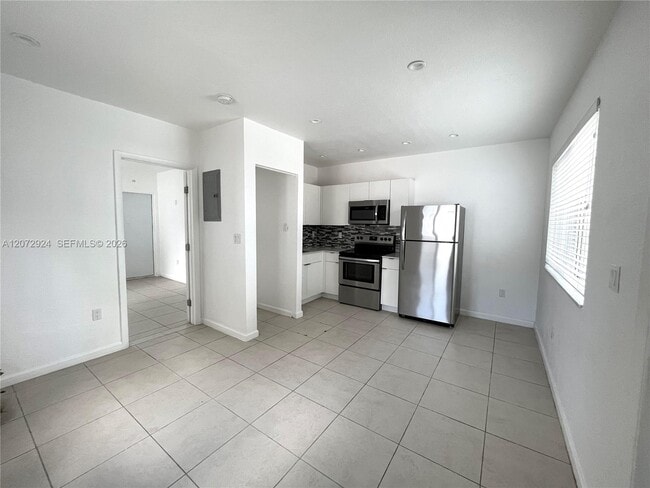 Building Photo - 6331 NE 4th Ct